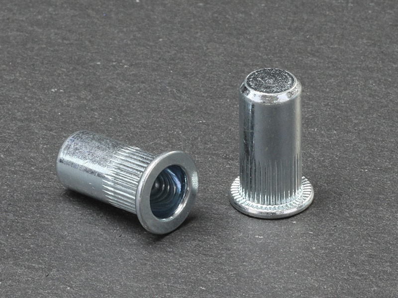 Flat head knurled body close end steel